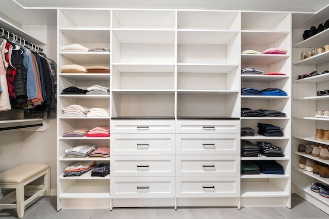 250 Daniel Burnham Sq Unit 402, Columbus, OH 43215 - walk in closet with light tile patterned floors