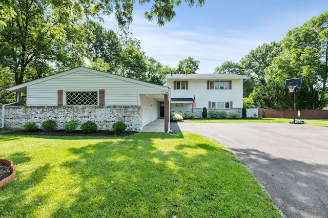 298 Flint Ridge Dr, Columbus, OH 43230 - view of front facade with driveway and an attached carport