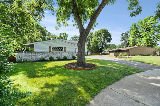 298 Flint Ridge Dr, Columbus, OH 43230 - view of green lawn featuring concrete driveway