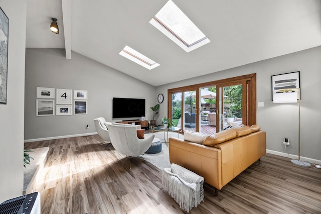 298 Flint Ridge Dr, Columbus, OH 43230 - living room featuring beam ceiling, a skylight, wood finished floors, and high vaulted ceiling