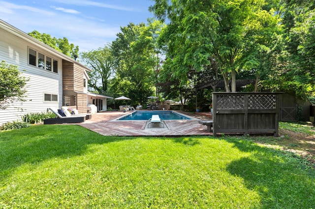 298 Flint Ridge Dr, Columbus, OH 43230 - view of swimming pool with a yard, a diving board, a deck, and a storage shed