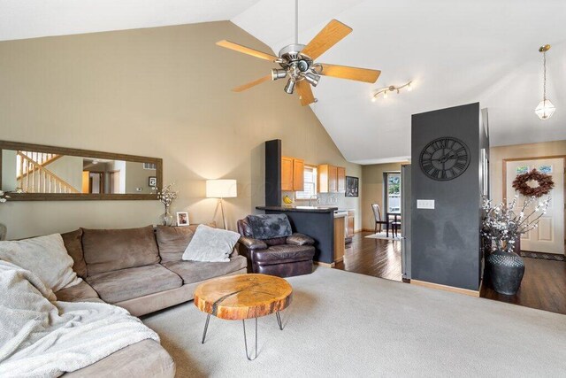 486 Ruffin Dr, Galloway, OH 43119 - living area with high vaulted ceiling, dark wood-style flooring, and ceiling fan