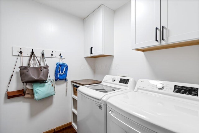 486 Ruffin Dr, Galloway, OH 43119 - laundry room featuring washing machine and dryer and cabinet space