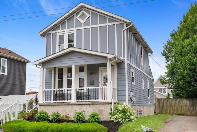 497 E Kossuth St, Columbus, OH 43206 - view of front of property featuring covered porch and board and batten siding