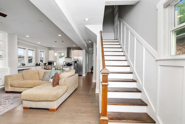 497 E Kossuth St, Columbus, OH 43206 - stairs featuring recessed lighting and wood finished floors