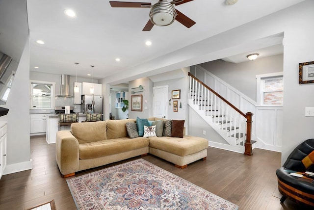 497 E Kossuth St, Columbus, OH 43206 - living area with ceiling fan, dark wood finished floors, stairs, and recessed lighting