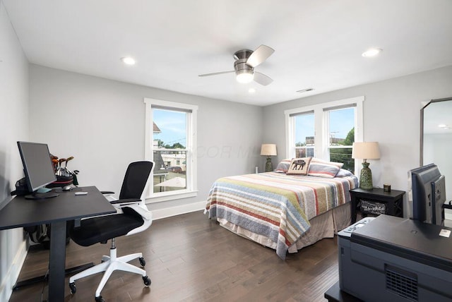 497 E Kossuth St, Columbus, OH 43206 - bedroom with dark wood-style flooring, a desk, recessed lighting, and a ceiling fan