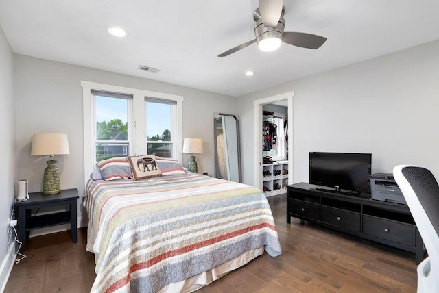 497 E Kossuth St, Columbus, OH 43206 - bedroom with wood finished floors, recessed lighting, a ceiling fan, and a spacious closet