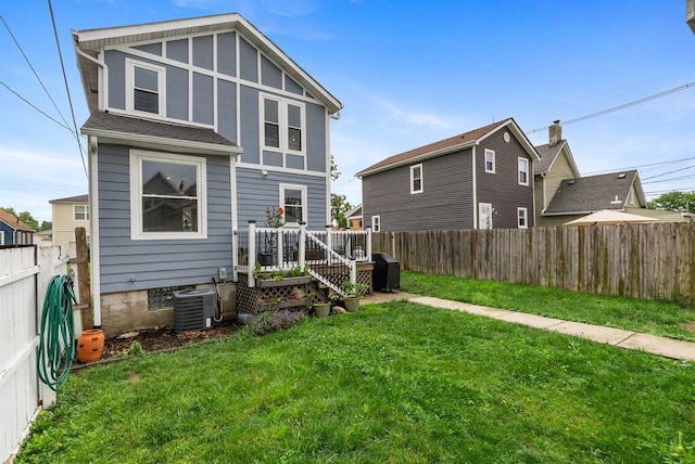 497 E Kossuth St, Columbus, OH 43206 - back of house with a fenced backyard and a wooden deck