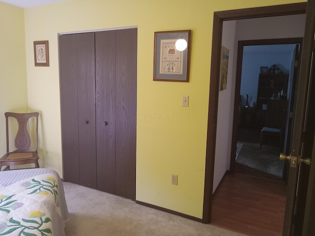 6978 Cook-Jones Rd, Waynesville, OH 45068 - bedroom featuring a closet and carpet floors