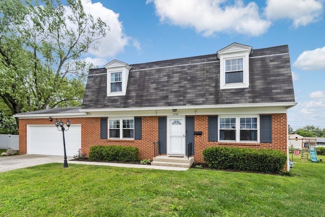 3748 Wagner Ct, Grove City, OH 43123 - colonial inspired home featuring an attached garage, roof with shingles, concrete driveway, and a front lawn