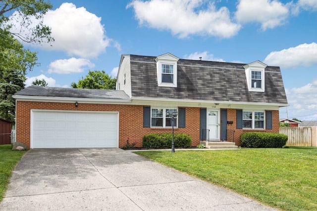 3748 Wagner Ct, Grove City, OH 43123 - dutch colonial with brick siding, concrete driveway, and a garage