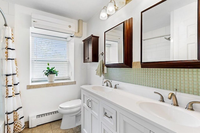 3748 Wagner Ct, Grove City, OH 43123 - full bathroom featuring a baseboard radiator, double vanity, tasteful backsplash, curtained shower, and tile patterned flooring