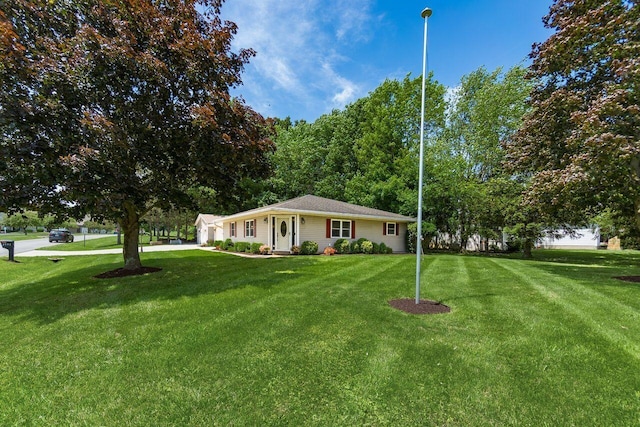 2591 Apple Valley Dr, Howard, OH 43028 - single story home with a front lawn and a garage