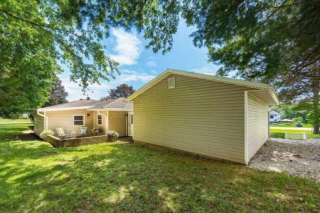 2591 Apple Valley Dr, Howard, OH 43028 - back of property with a lawn and a patio