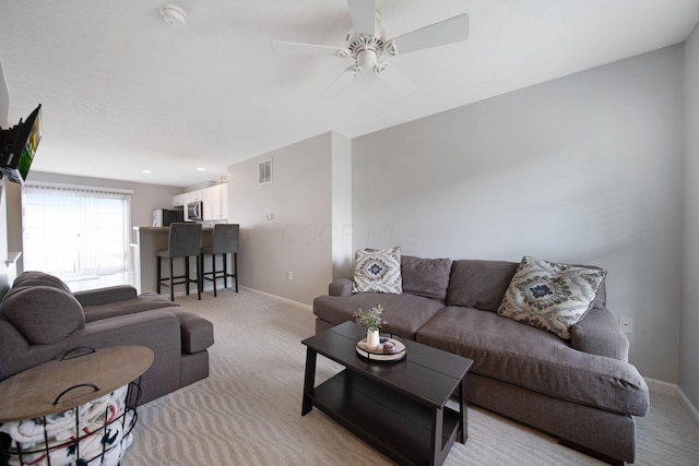 6295 Royal Tern Xing, Columbus, OH 43230 - living area with light carpet and ceiling fan