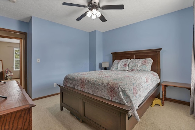 224 Macandrews Way Unit 60A, Blacklick, OH 43004 - bedroom featuring light colored carpet, ceiling fan, and a textured ceiling