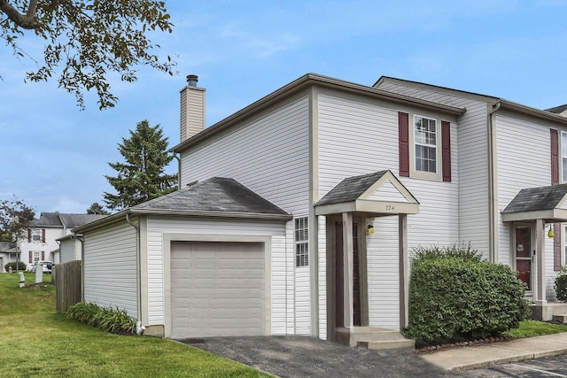224 Macandrews Way Unit 60A, Blacklick, OH 43004 - traditional home featuring an attached garage, a chimney, and a front yard