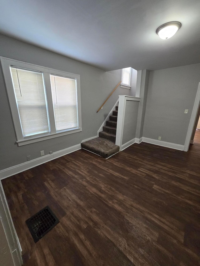 2205-2207 Sullivant Ave, Columbus, OH 43223 - basement featuring stairway and dark wood finished floors