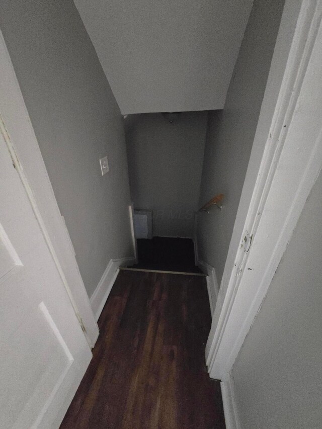 2205-2207 Sullivant Ave, Columbus, OH 43223 - staircase with wood finished floors and baseboards