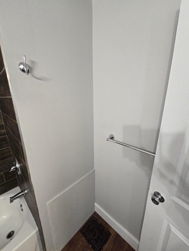 2205-2207 Sullivant Ave, Columbus, OH 43223 - full bath with shower / bathtub combination and wood finished floors