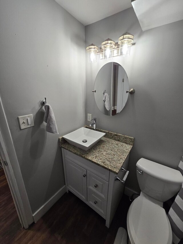 2205-2207 Sullivant Ave, Columbus, OH 43223 - bathroom with wood finished floors and vanity