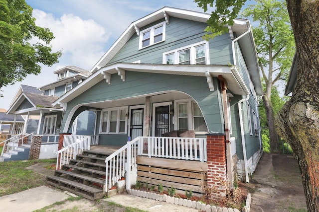 2205-2207 Sullivant Ave, Columbus, OH 43223 - traditional style home featuring a porch