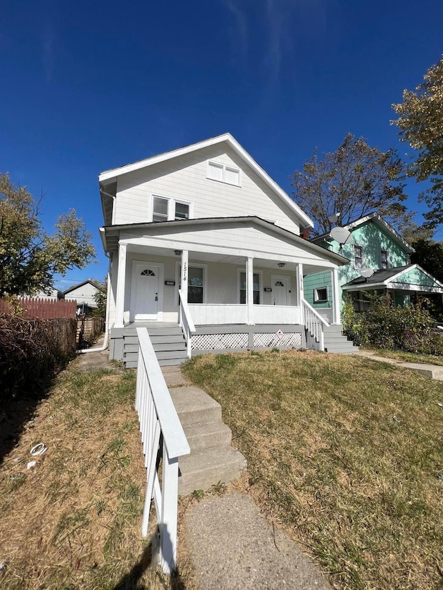 1514-1516 E 26th Ave, Columbus, OH 43211 - shotgun-style home with a porch