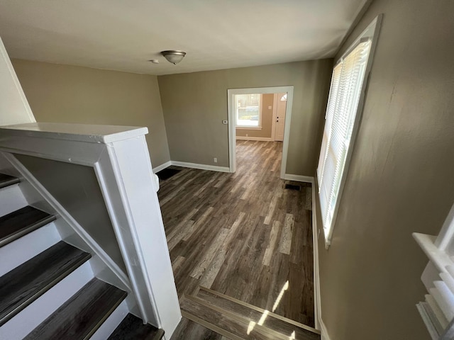 1514-1516 E 26th Ave, Columbus, OH 43211 - corridor featuring dark wood-type flooring and stairway