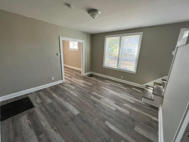1514-1516 E 26th Ave, Columbus, OH 43211 - unfurnished room with dark wood-style flooring and baseboards