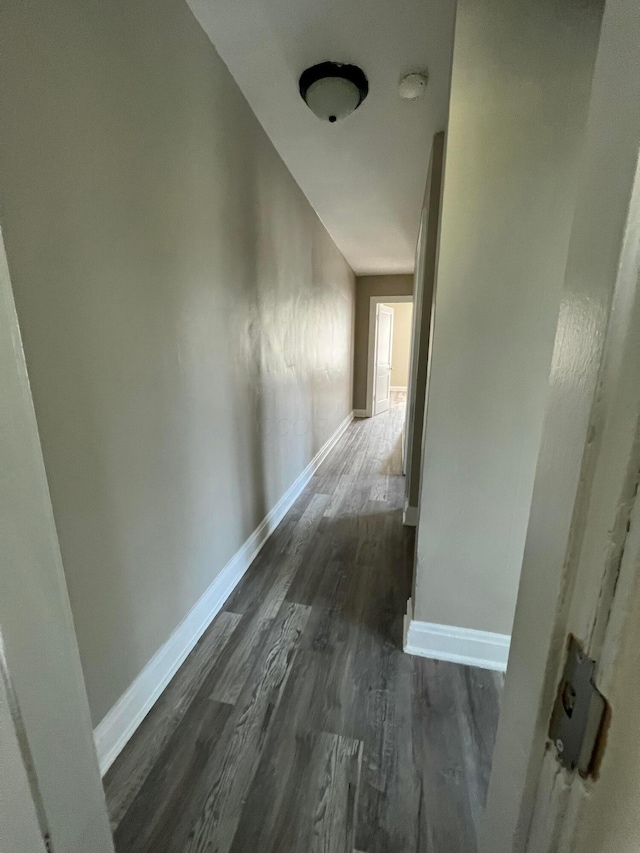 1514-1516 E 26th Ave, Columbus, OH 43211 - hallway featuring dark wood-type flooring and baseboards