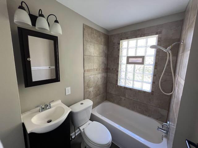 1514-1516 E 26th Ave, Columbus, OH 43211 - full bathroom featuring vanity and bathing tub / shower combination