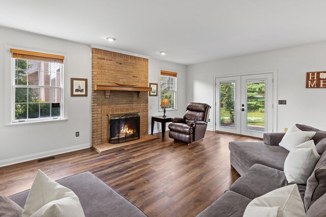 271 Crawford Ct, Westerville, OH 43082 - living area with dark wood-type flooring, a fireplace, recessed lighting, and french doors