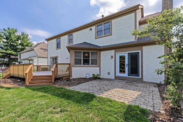 271 Crawford Ct, Westerville, OH 43082 - back of house featuring a lawn, a patio area, stucco siding, and a deck