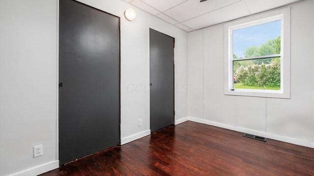 215 S Market St, Somerset, OH 43783 - unfurnished bedroom with wood finished floors and baseboards