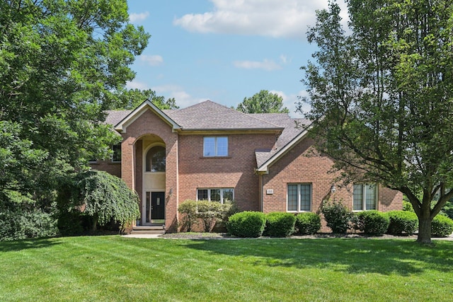 1318 Retreat Ln, New Albany, OH 43054 - traditional-style home featuring a front yard and brick siding