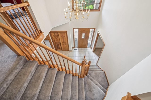 1318 Retreat Ln, New Albany, OH 43054 - foyer entrance featuring a high ceiling, stairs, and a chandelier