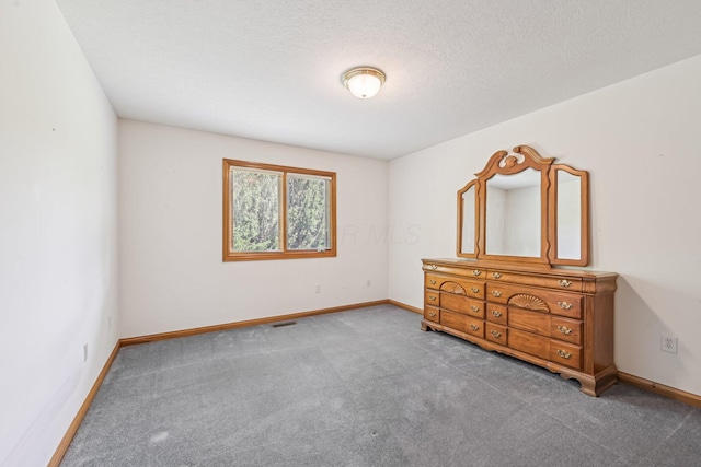 1318 Retreat Ln, New Albany, OH 43054 - unfurnished bedroom featuring carpet floors and a textured ceiling