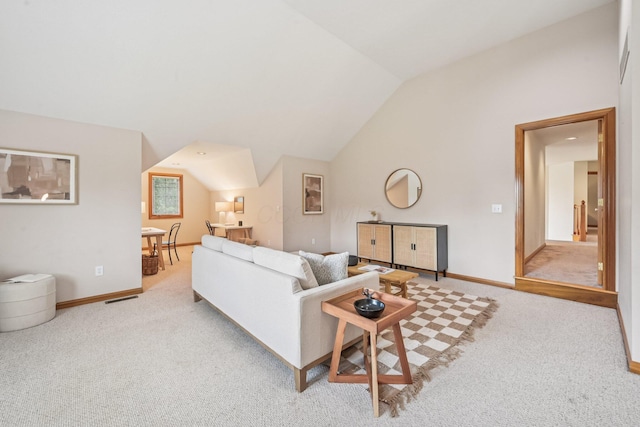 1318 Retreat Ln, New Albany, OH 43054 - carpeted living area with vaulted ceiling and baseboards