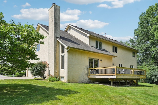 1318 Retreat Ln, New Albany, OH 43054 - rear view of property featuring stucco siding, a deck, a lawn, a chimney, and roof with shingles