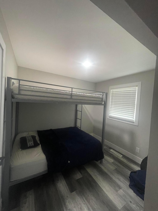 3107 Huntington Dr, Columbus, OH 43207 - bedroom featuring wood finished floors and baseboards