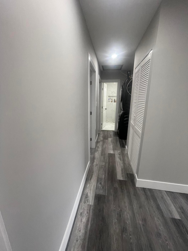 3107 Huntington Dr, Columbus, OH 43207 - corridor featuring dark wood-style floors and baseboards