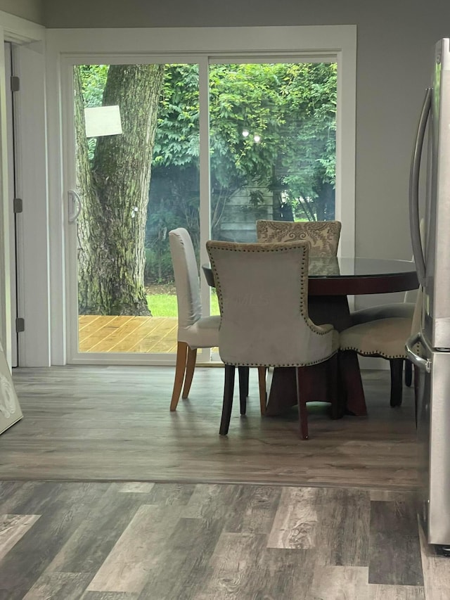3107 Huntington Dr, Columbus, OH 43207 - dining room featuring healthy amount of natural light and wood finished floors