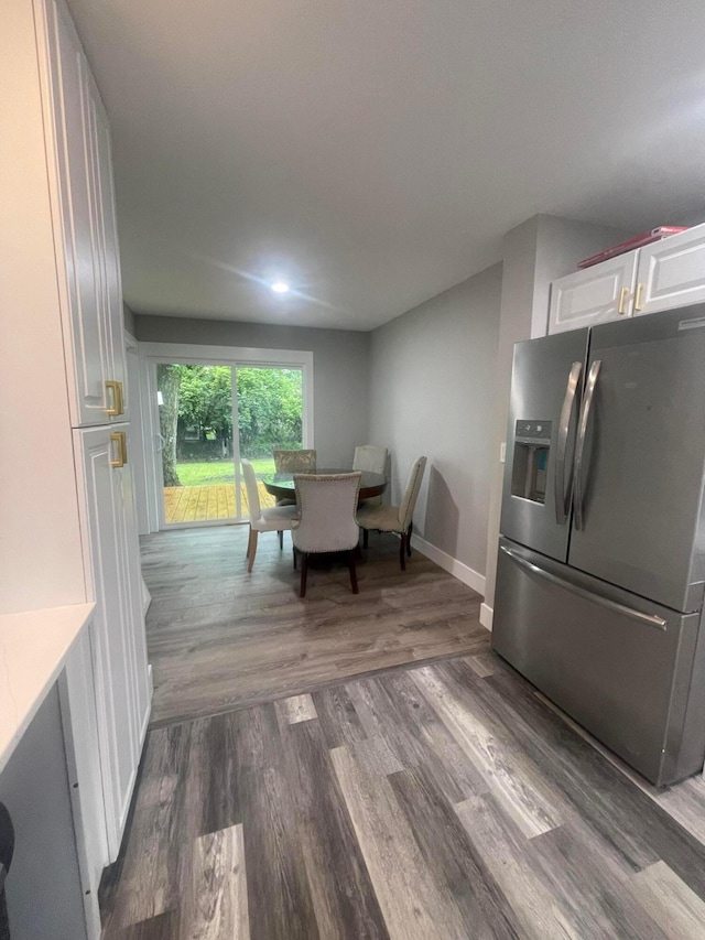 3107 Huntington Dr, Columbus, OH 43207 - dining space with dark wood-style flooring and baseboards