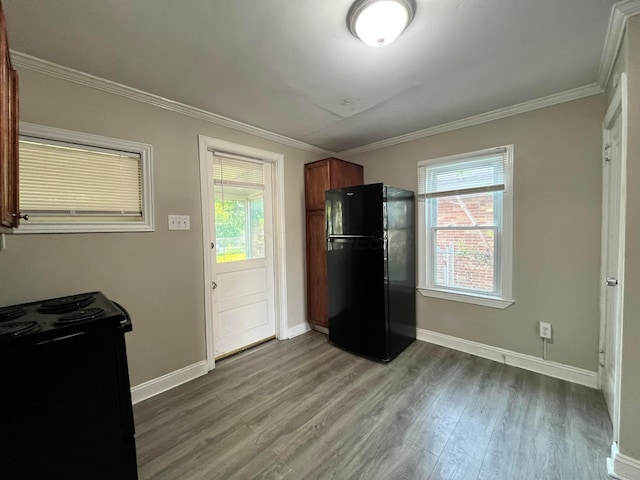 1015 Fairwood Ave, Columbus, OH 43206 - kitchen with black appliances, wood finished floors, ornamental molding, and brown cabinetry