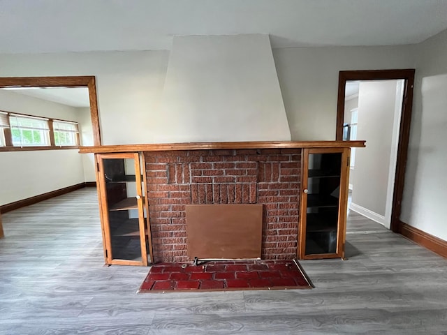1015 Fairwood Ave, Columbus, OH 43206 - detailed view of wood finished floors and a fireplace