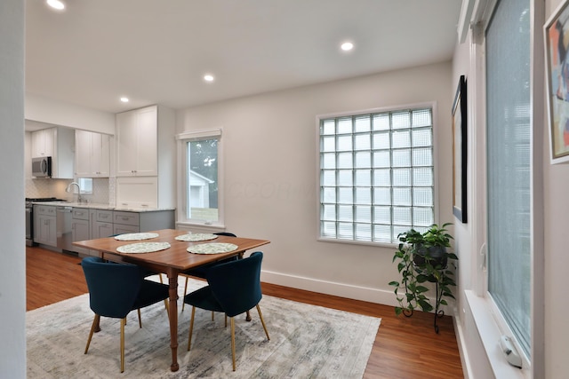 595 Brookside Dr, Columbus, OH 43209 - dining space with wood finished floors and recessed lighting