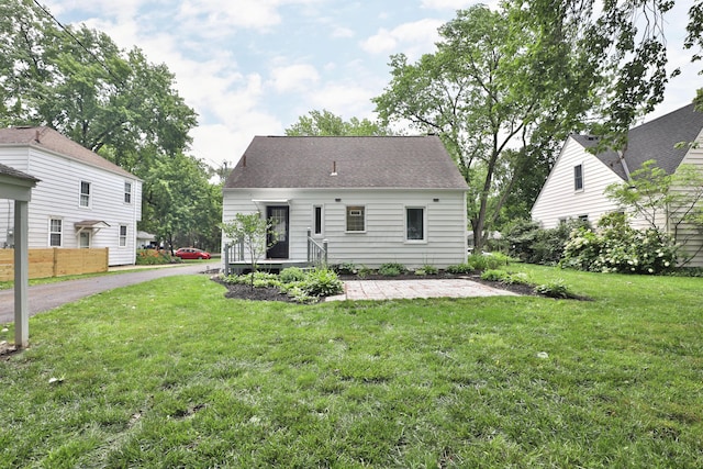 595 Brookside Dr, Columbus, OH 43209 - rear view of house featuring a lawn and a patio area