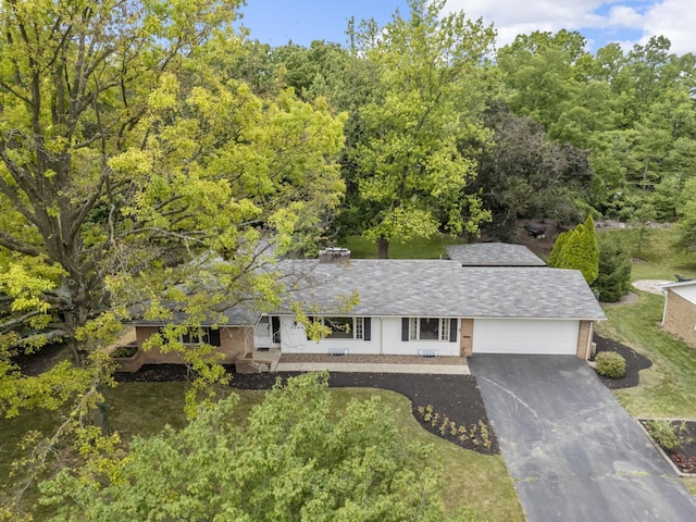 4289 Shelbourne Ln, Columbus, OH 43220 - ranch-style home with driveway and an attached garage