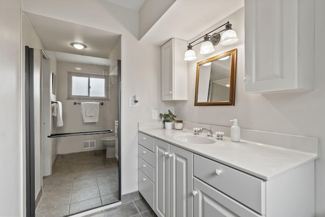 4289 Shelbourne Ln, Columbus, OH 43220 - bathroom with vanity, a shower, and tile patterned floors